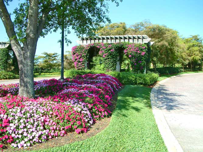 Flowers at the main entry anounce "You Are Here" at Mediterra - Naples, Florida